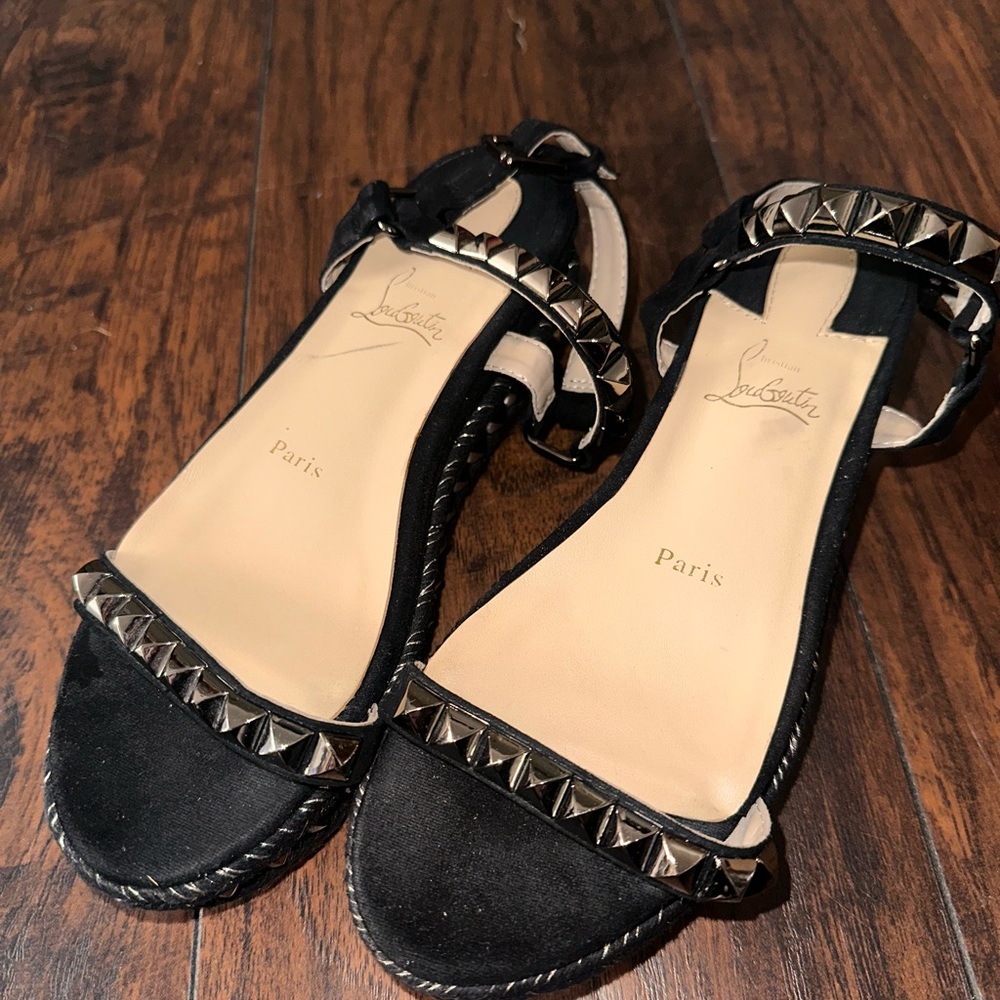 Black and silver studded Louboutin sandals #Louboutin #Sandals